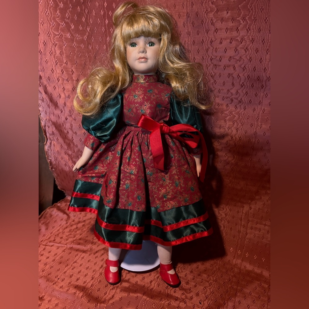 Elegant Red and Green Doll with Ribbon